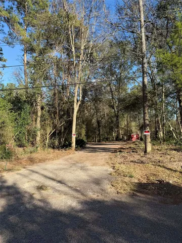 a view of road with trees