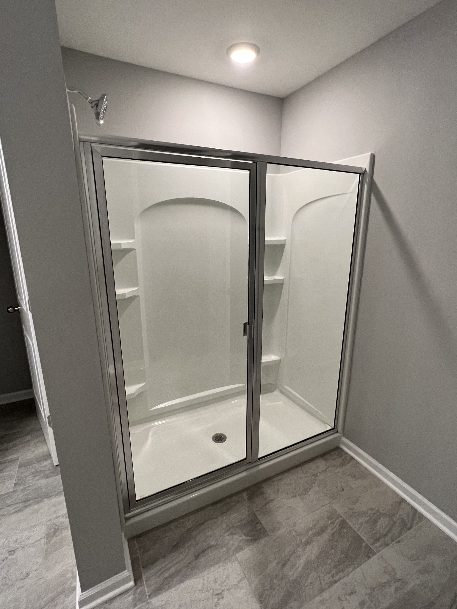 5741 Dockside Drive Rockvale, TN 37153 - Photo 13 of 22 a bathroom with a glass door shower