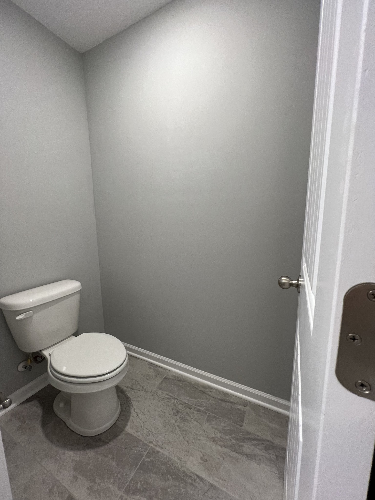 5741 Dockside Drive Rockvale, TN 37153 - Photo 14 of 22 a white toilet sitting next to a shower
