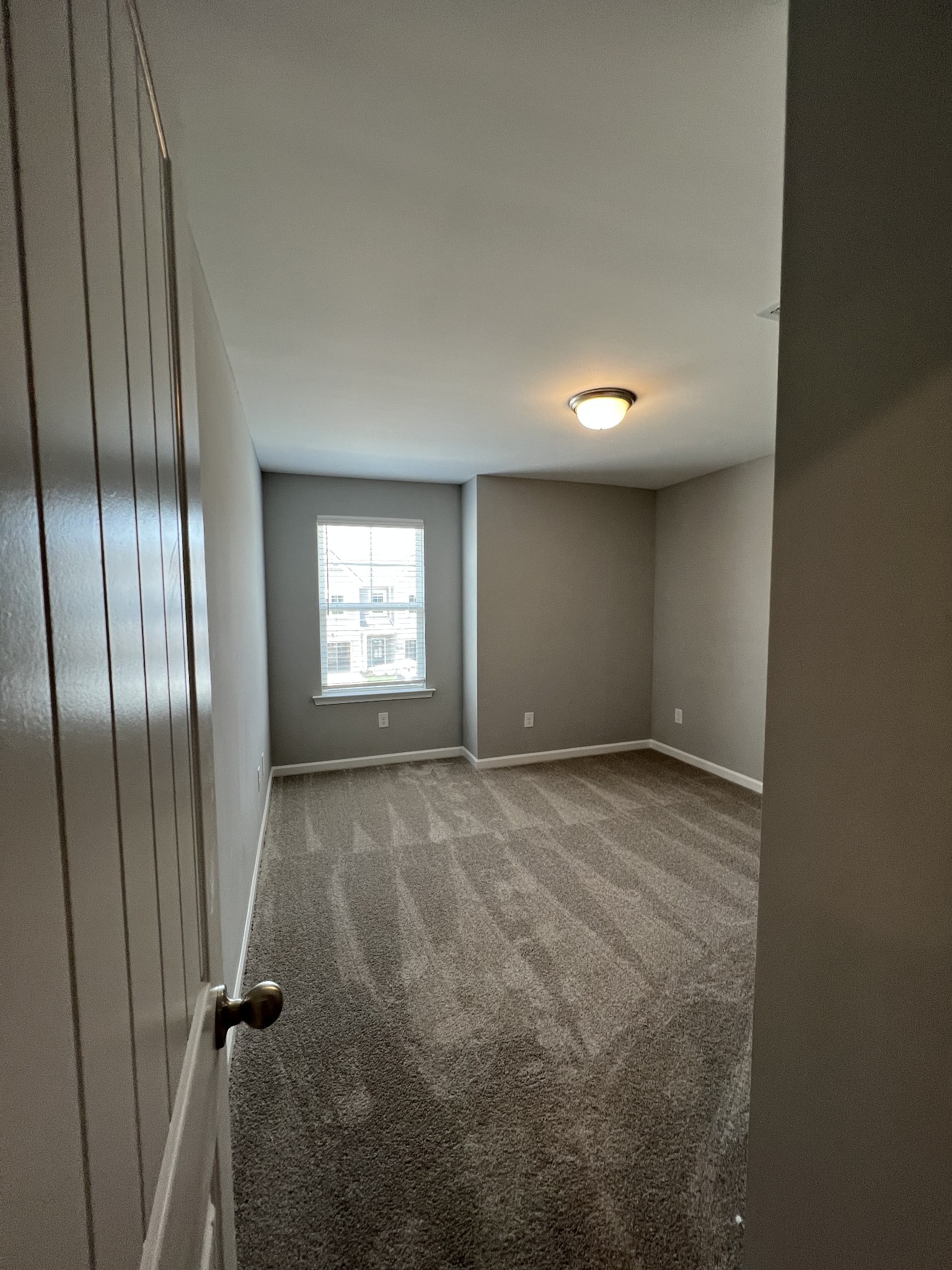 5741 Dockside Drive Rockvale, TN 37153 - Photo 16 of 22 an empty room with windows