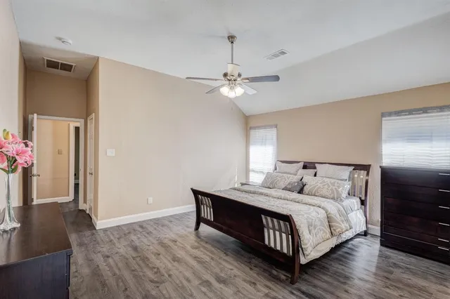a bathroom with a bathtub and a sink