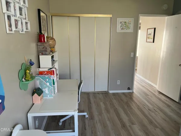 a view of small space with wooden floor