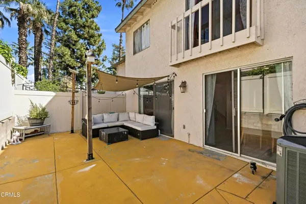 a view of a house with a sink and a potted plant
