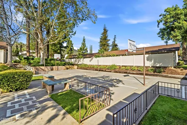 an aerial view of a residential apartment building with a yard
