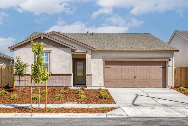 a view of a house with a patio