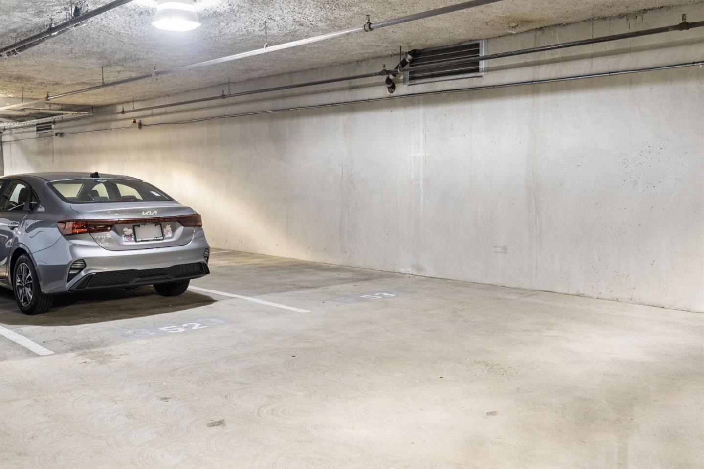 655 12th Street, Unit 312 Oakland, CA 94607 - Photo 12 of 14 a view of a car parked in garage