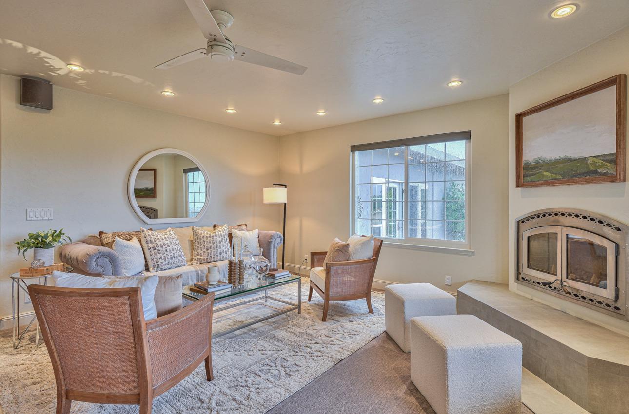 22511 Murietta Road Salinas, CA 93908 - Photo 13 of 58 a living room with furniture and a fireplace