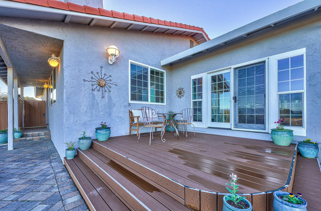22511 Murietta Road Salinas, CA 93908 - Photo 32 of 58 a view of a deck with table and chairs and wooden floor