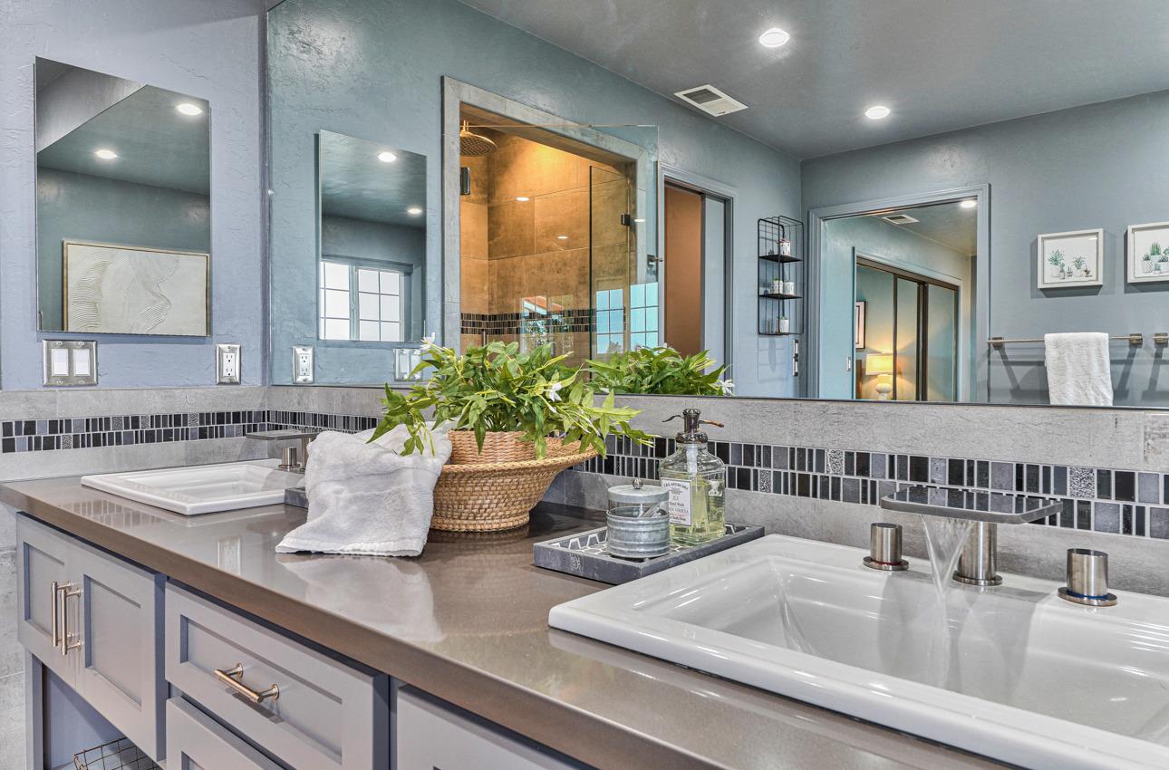 22511 Murietta Road Salinas, CA 93908 - Photo 44 of 58 a kitchen with a sink and wooden floor