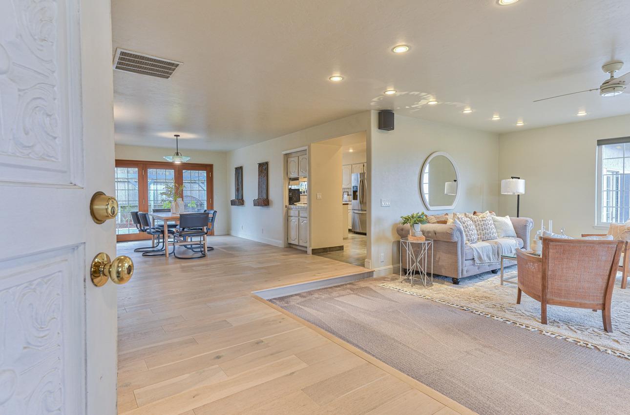 22511 Murietta Road Salinas, CA 93908 - Photo 9 of 58 a bedroom with furniture and a chandelier