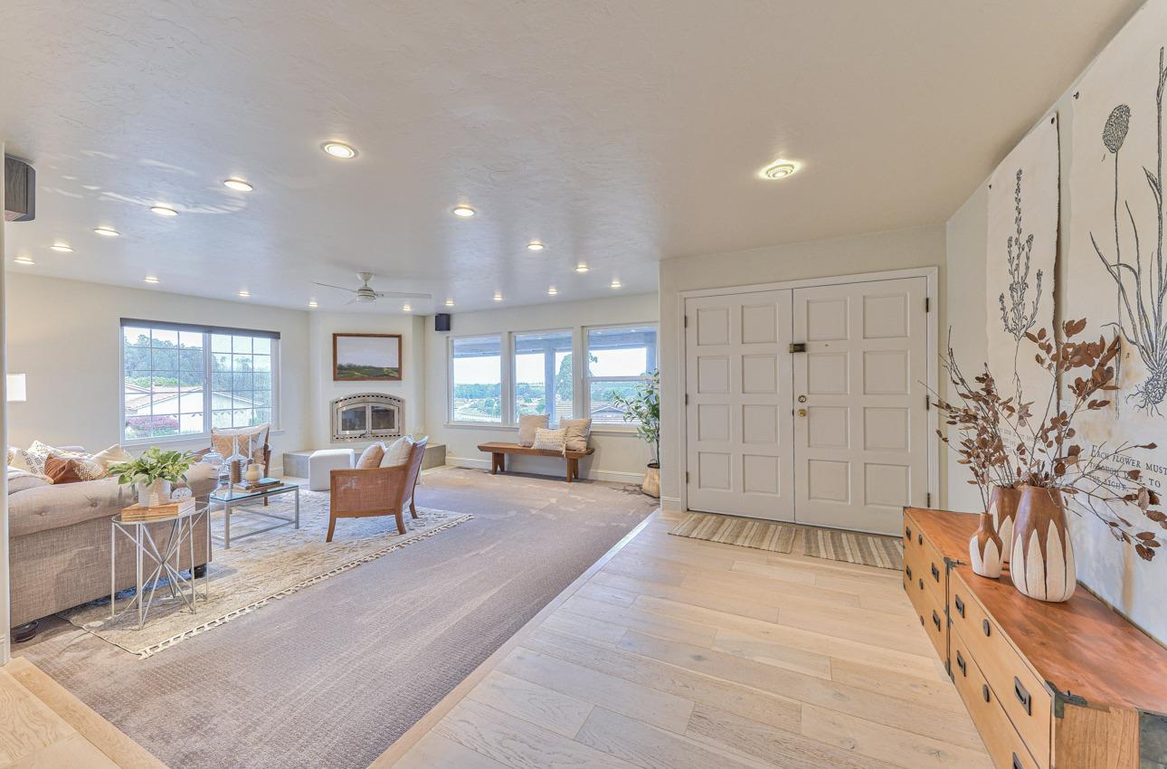 22511 Murietta Road Salinas, CA 93908 - Photo 10 of 58 a living room with furniture large window and flat screen tv