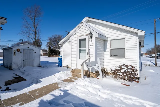 a view of a house with a patio