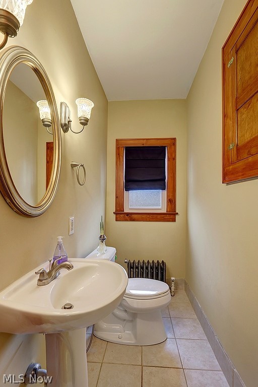 3041 Yorkshire Road Cleveland, OH 44118 - Photo 15 of 25 The half bath on the first floor is roomy and has built-in storage.