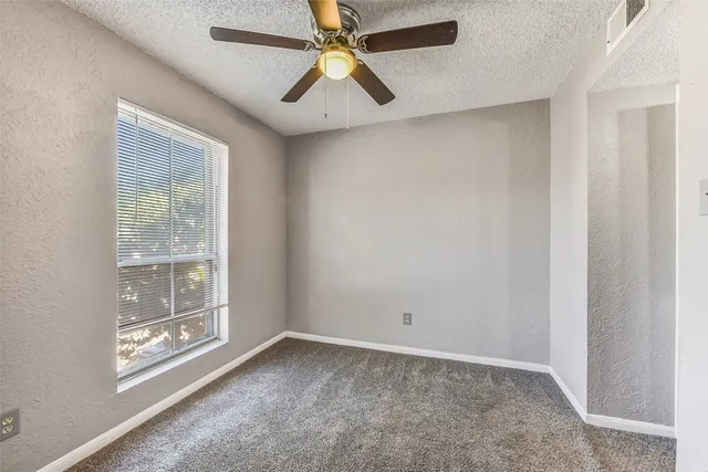 wooden floor and a fireplace in a room