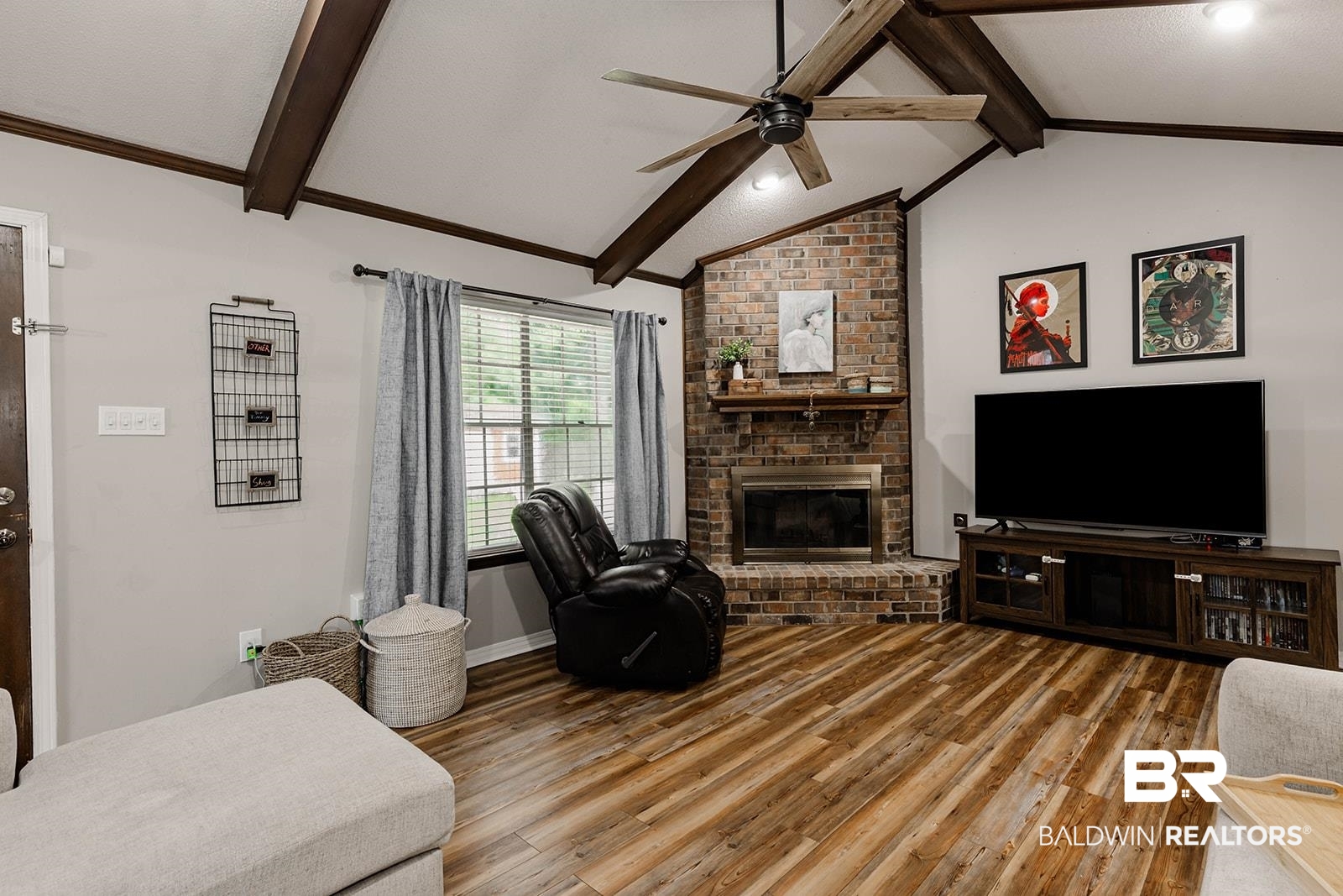 2920 Quail Creek Run Mobile, AL 36695 - Photo 12 of 33 Living area with a ceiling fan, light wood-style flooring, and a brick fireplace
