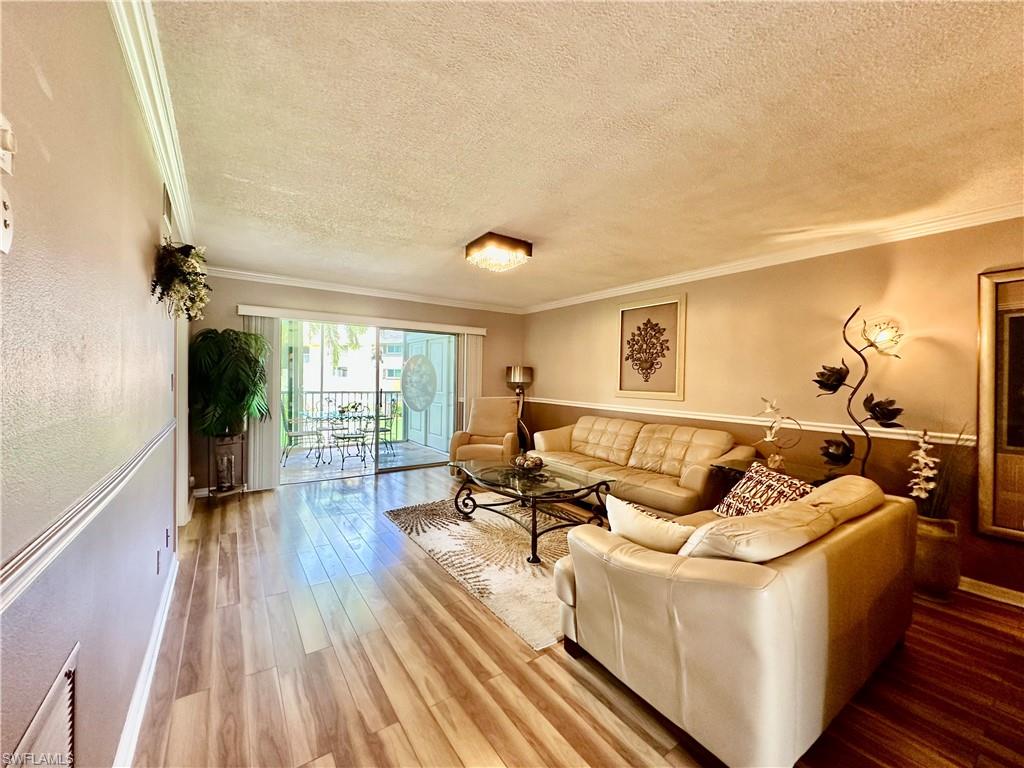 5467 Rattlesnake Hammock Road, Unit 207 Naples, FL 34113 - Photo 1 of 27