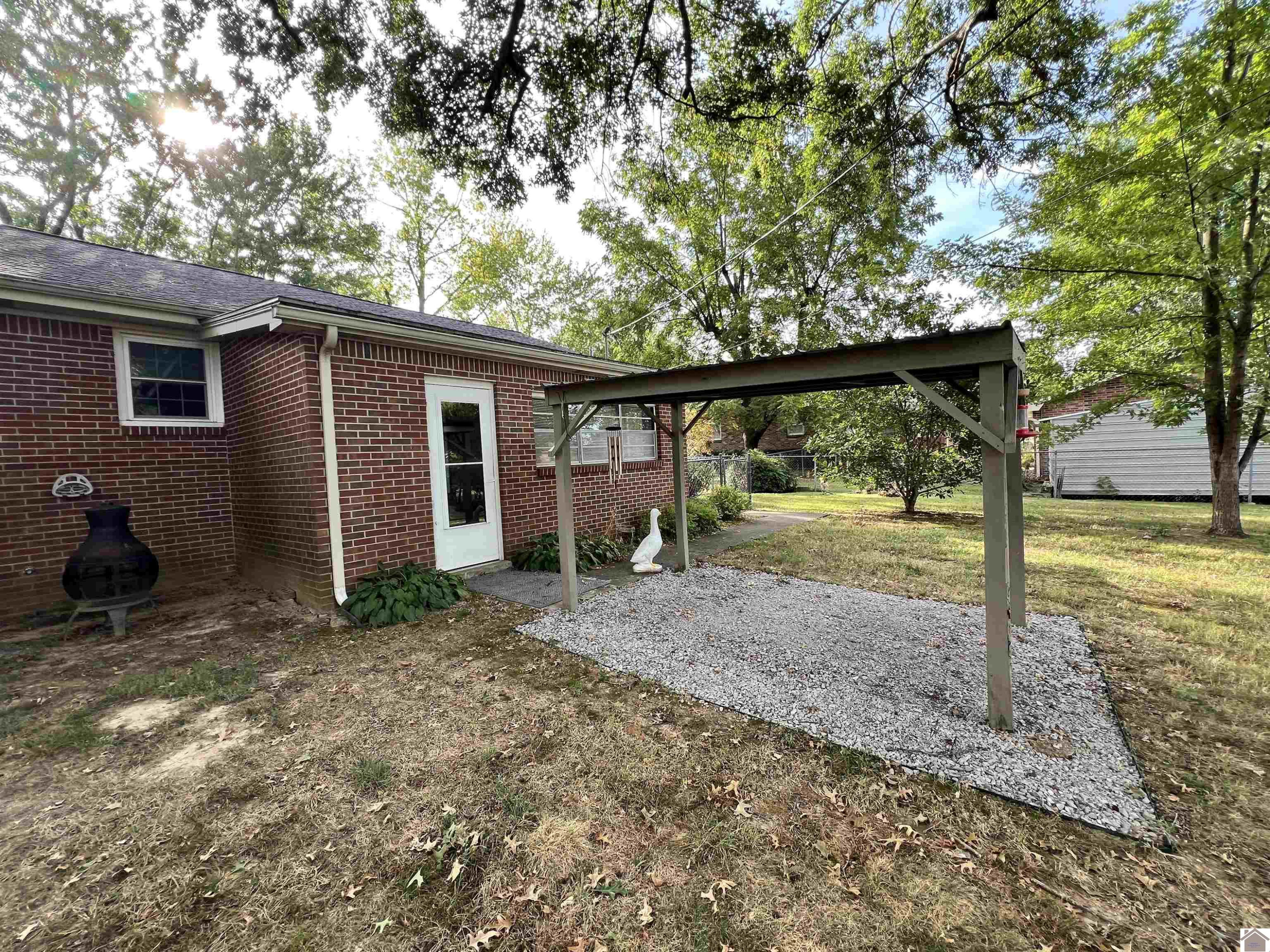 822 South 9th Street Murray, KY 42071 - Photo 25 of 29 Covered Area in Back Yard