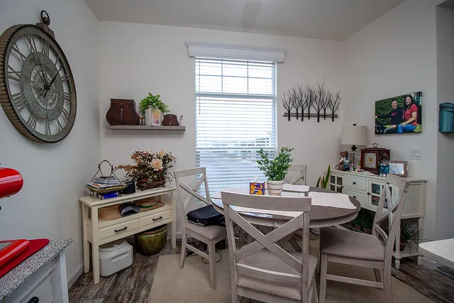 a workspace with furniture and window