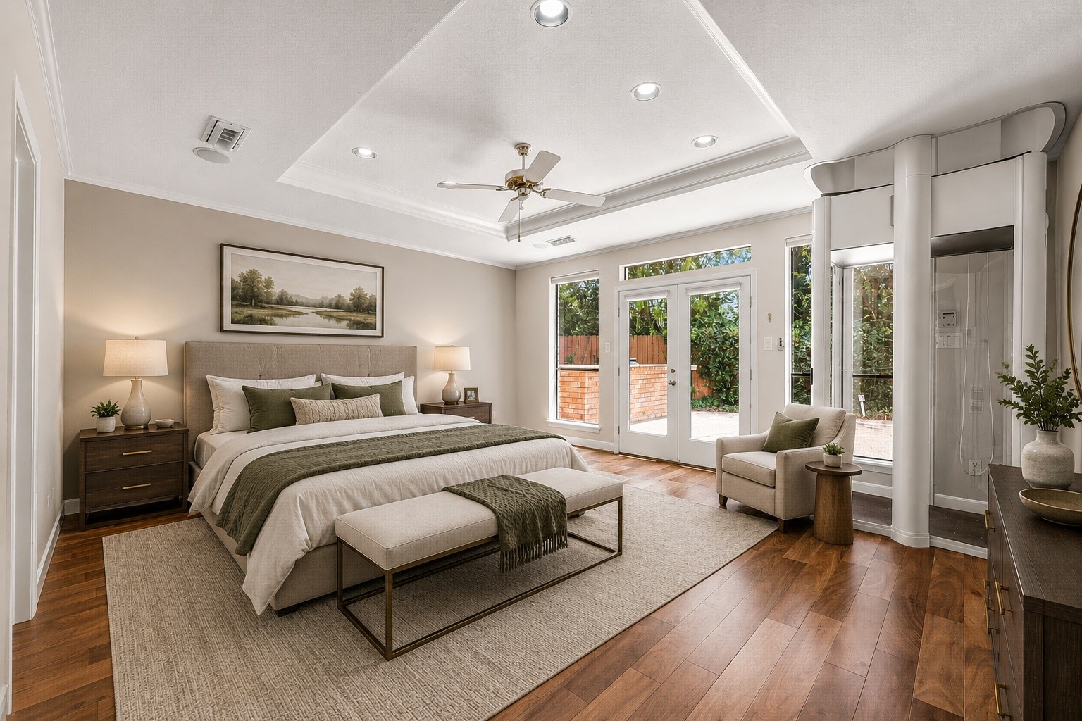 18503 Cabaniss Circle Spring, TX 77379 - Photo 22 of 49 Approx. 18' x 16' primary suite with a tray ceiling, hardwood floors, private patio access, and space for a true sitting area. (virtually staged)