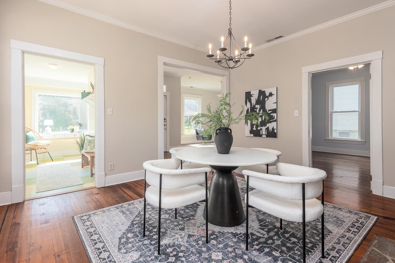 519 Summitt Street Memphis, TN 38104 - Photo 11 of 40 a view of a dining room with furniture and wooden floor
