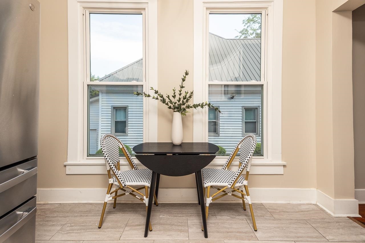 519 Summitt Street Memphis, TN 38104 - Photo 18 of 40 a view of a dining room with furniture and a window
