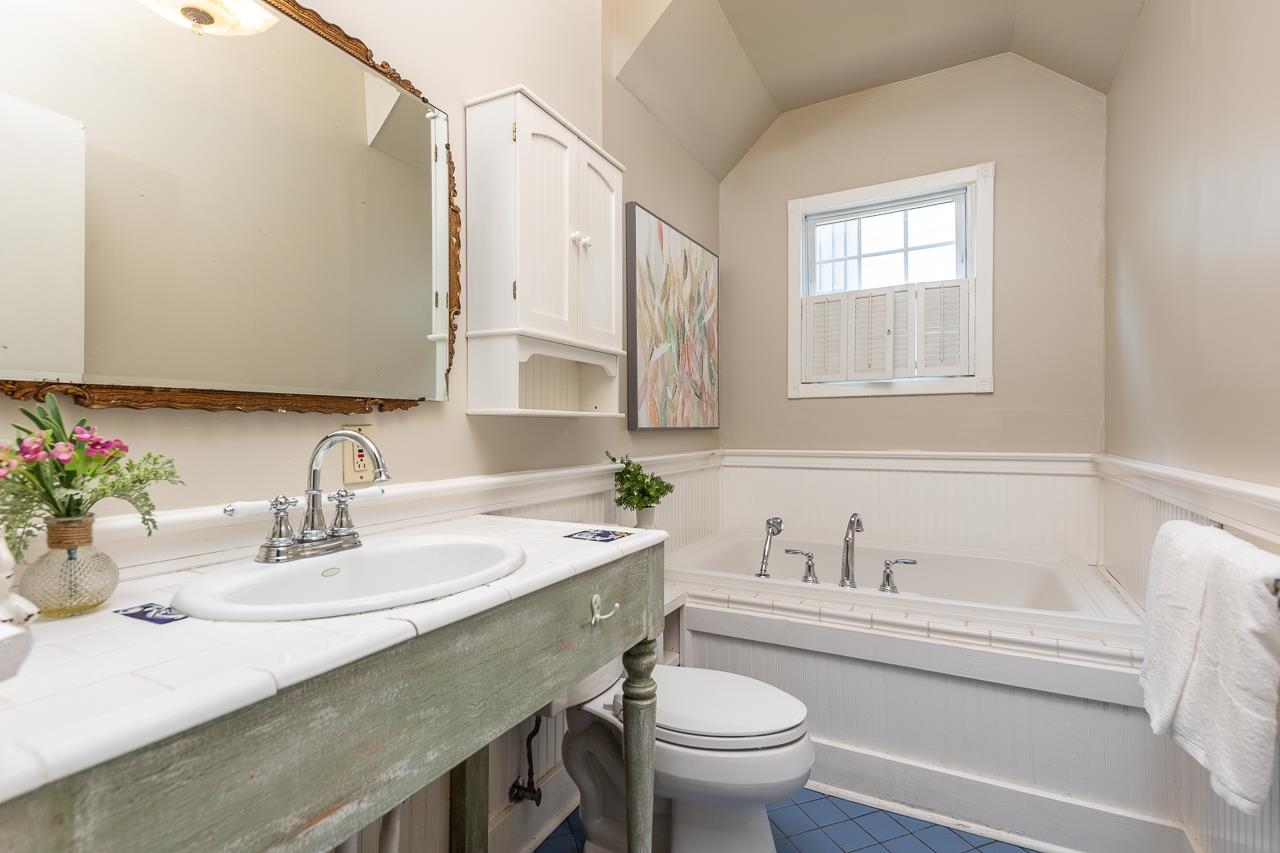 519 Summitt Street Memphis, TN 38104 - Photo 26 of 40 a bathroom with a sink and a mirror