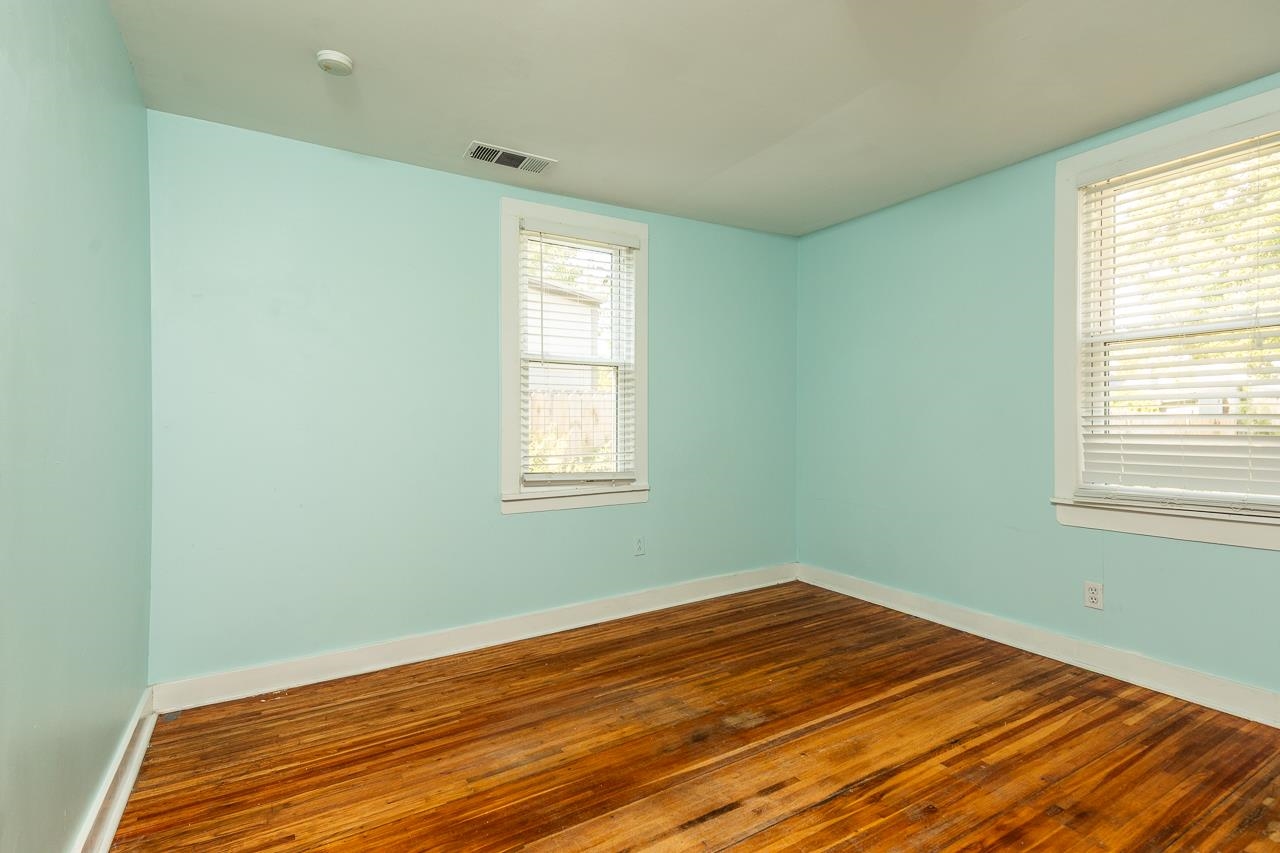 519 Summitt Street Memphis, TN 38104 - Photo 29 of 40 a view of a room with wooden floor and fan