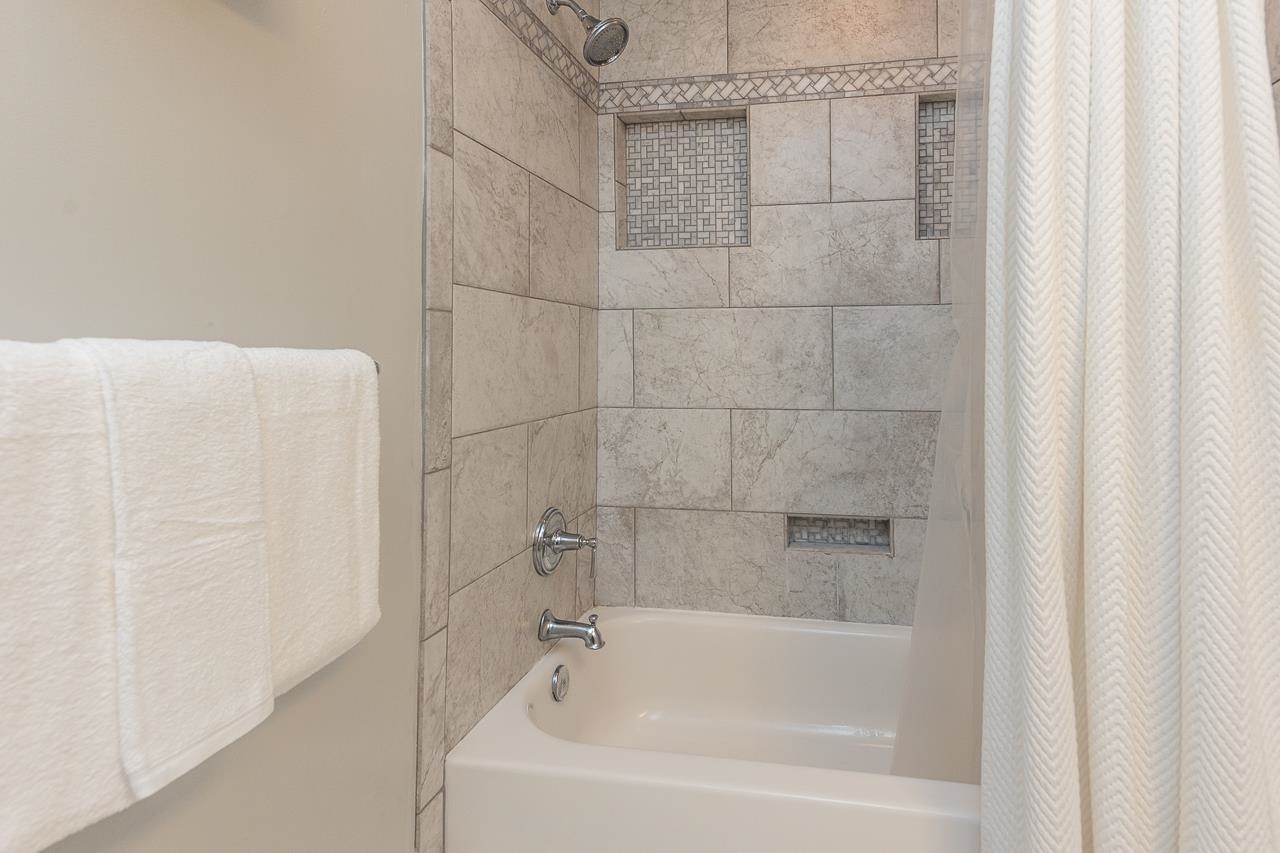 519 Summitt Street Memphis, TN 38104 - Photo 31 of 40 a close up of a bathtub curtain