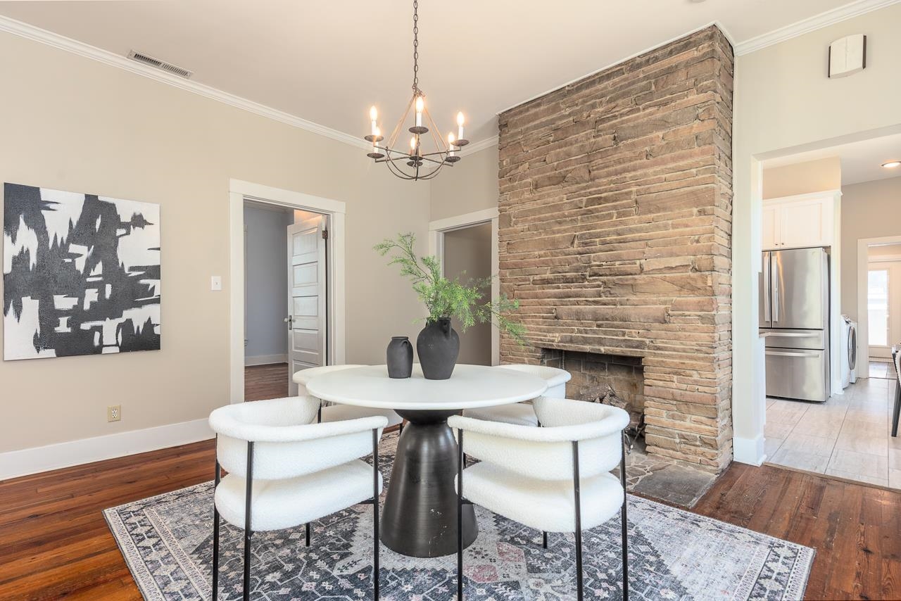 519 Summitt Street Memphis, TN 38104 - Photo 10 of 40 a view of a dining room with furniture and wooden floor
