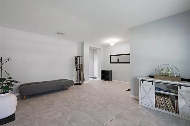 a bathroom with a granite countertop sink