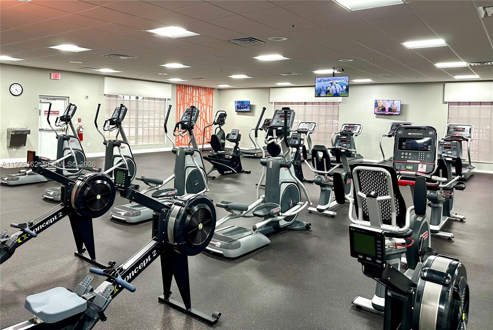 142 Preston F, Unit 142 Boca Raton, FL 33434 - Photo 18 of 28 a view of a room with gym equipment