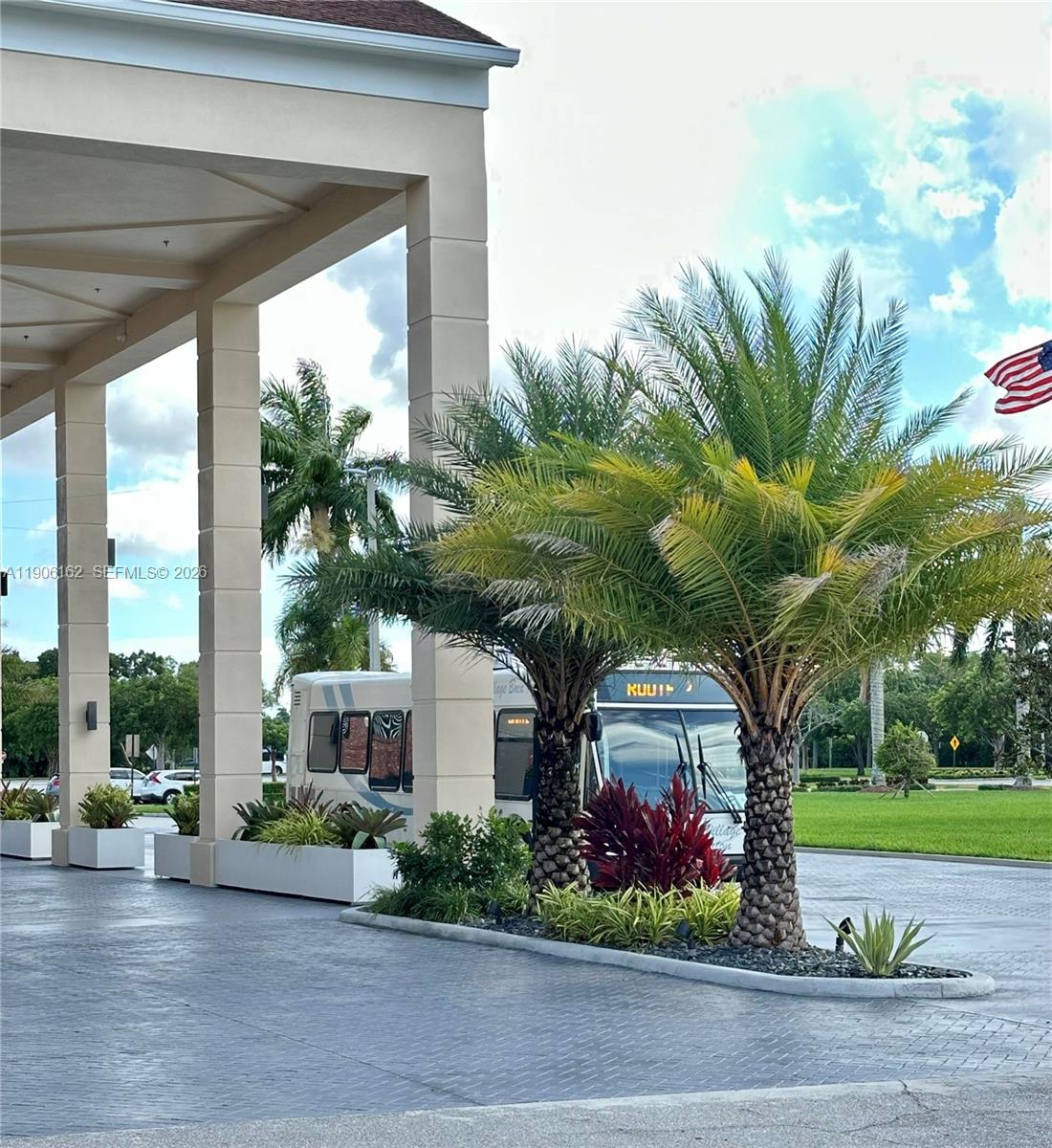 142 Preston F, Unit 142 Boca Raton, FL 33434 - Photo 25 of 28 a front view of a house with a garden