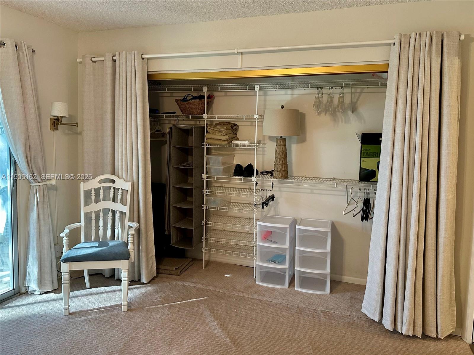 142 Preston F, Unit 142 Boca Raton, FL 33434 - Photo 10 of 28 a view of a livingroom with furniture and staircase