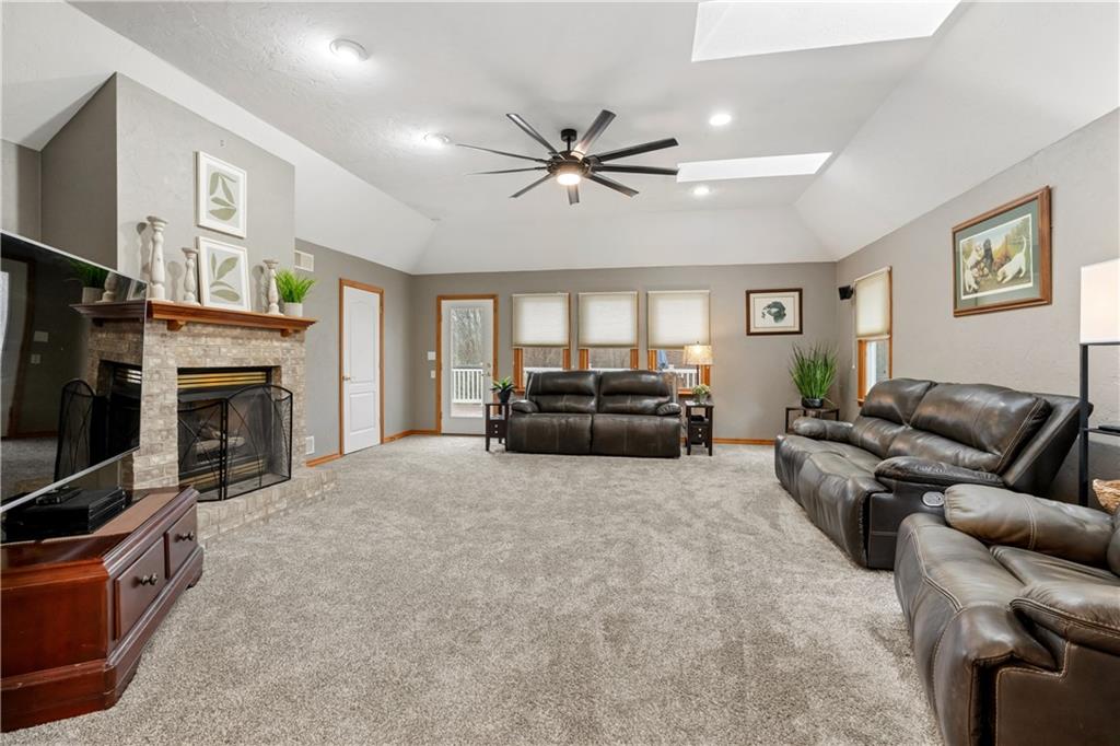 2108 Mickanin Road Irwin, PA 15642 - Photo 12 of 31 a living room with furniture and a fireplace