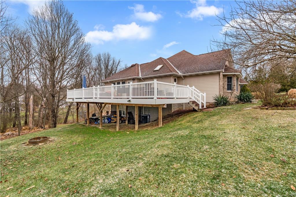 2108 Mickanin Road Irwin, PA 15642 - Photo 21 of 31 a view of a house with a yard and sitting area