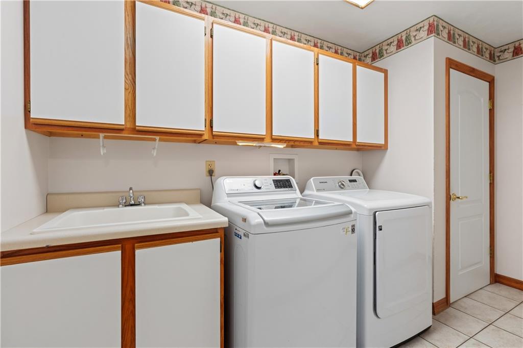 2108 Mickanin Road Irwin, PA 15642 - Photo 22 of 31 a utility room with dryer and washer