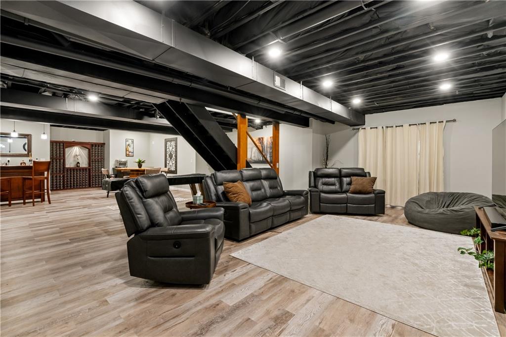 2108 Mickanin Road Irwin, PA 15642 - Photo 25 of 31 a living room with furniture and a flat screen tv