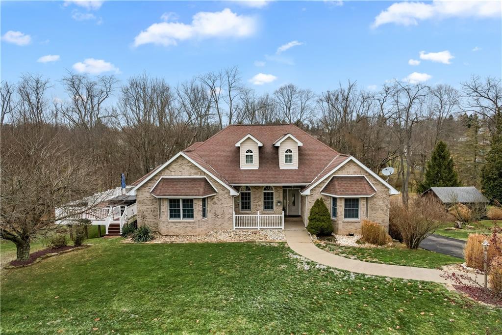 2108 Mickanin Road Irwin, PA 15642 - Photo 31 of 31 a front view of a house with garden