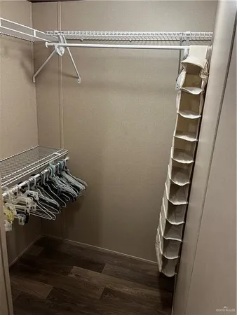 a view of a room with racks on the wall