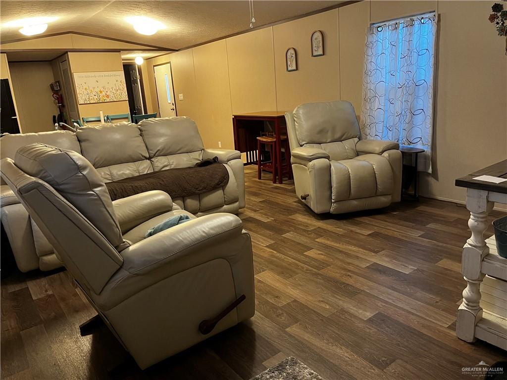 2503 Double Eagle Drive Mission, TX 78572 - Photo 6 of 15 a living room with furniture and a wooden floor
