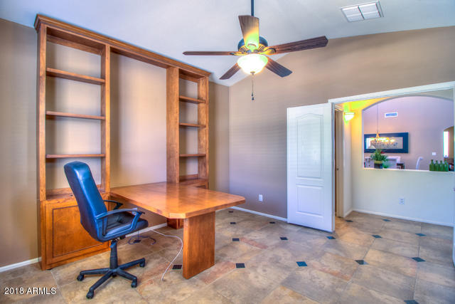 42811 West Venture Road Maricopa, AZ 85138 - Photo 3 of 61 a view of a room with a table and chairs