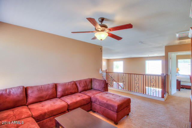 42811 West Venture Road Maricopa, AZ 85138 - Photo 44 of 61 a living room with furniture