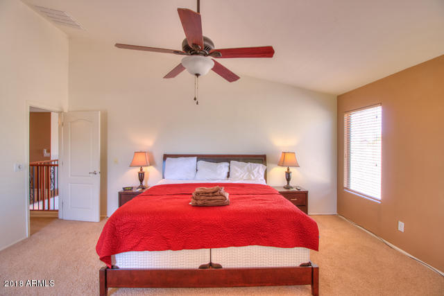 42811 West Venture Road Maricopa, AZ 85138 - Photo 45 of 61 a bedroom with a bed and window