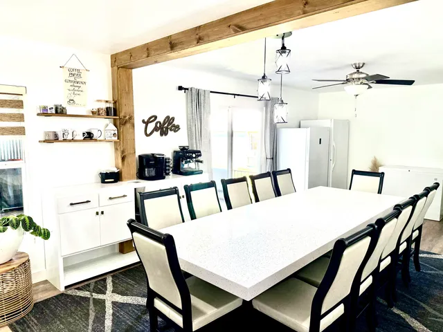 a workspace with furniture and window