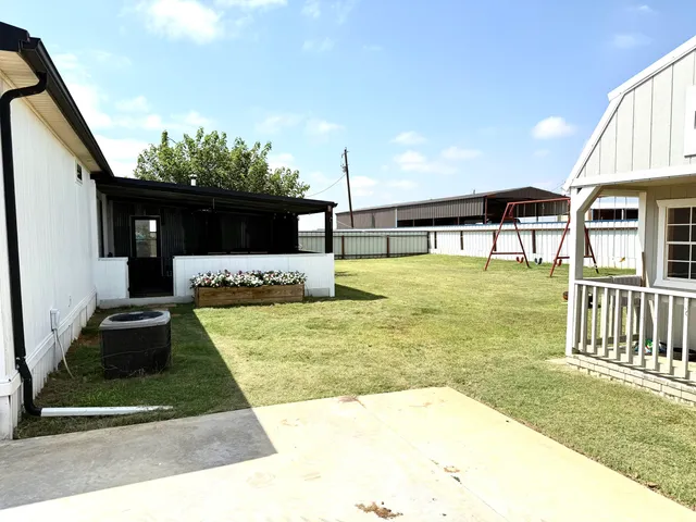 a view of backyard of house
