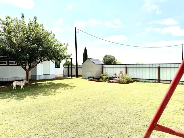 a swimming pool view with a lake view