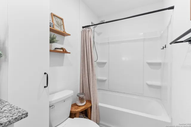 a view of a back yard of the house