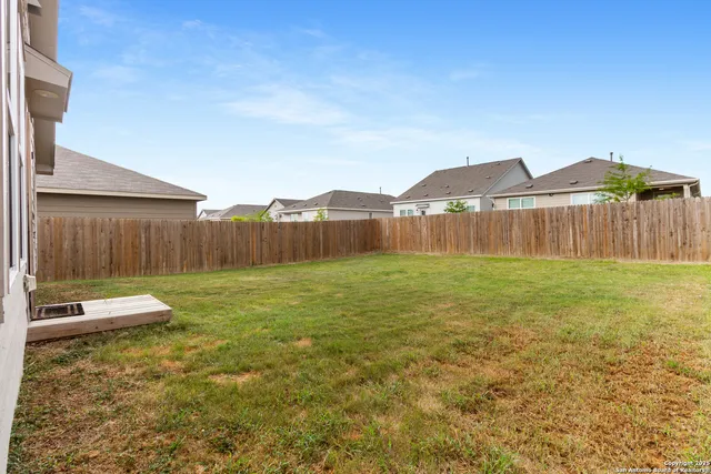 a view of a house with a garden