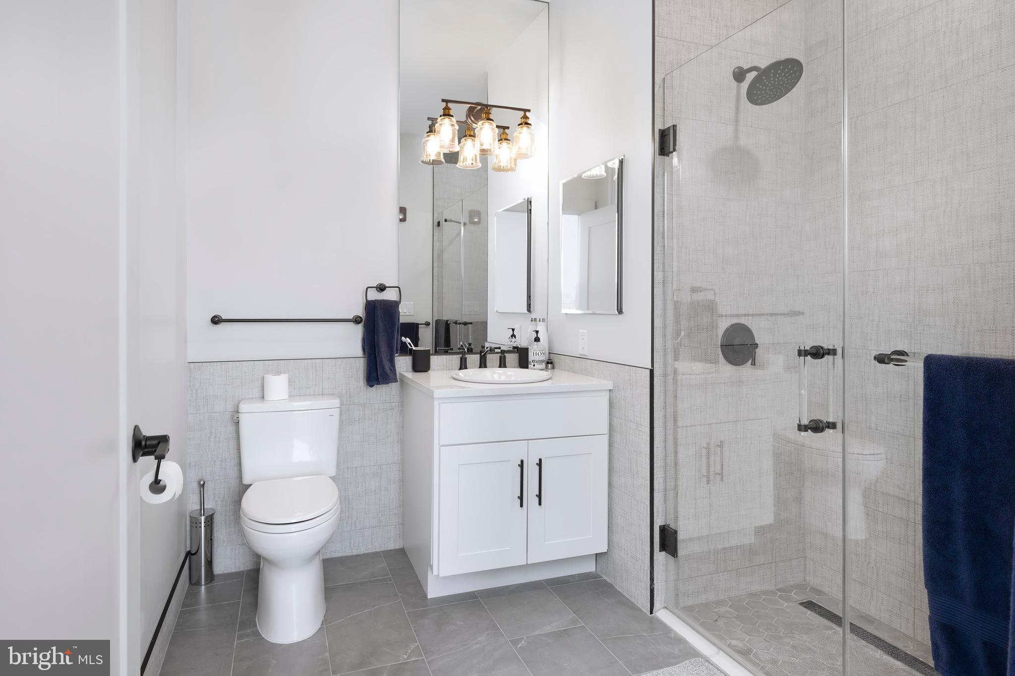 45 Spring Street, Unit PH6 Princeton, NJ 08542 - Photo 15 of 21 a bathroom with a toilet sink and shower