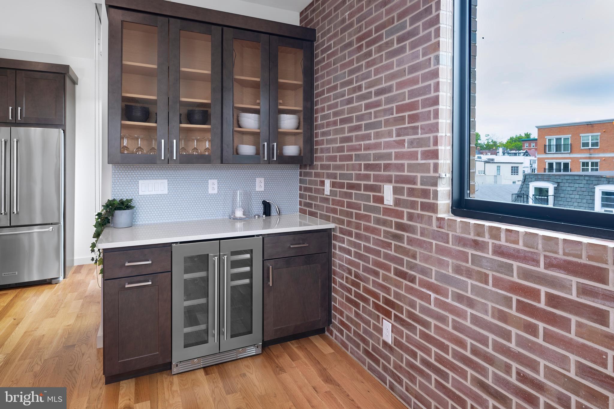 45 Spring Street, Unit PH6 Princeton, NJ 08542 - Photo 9 of 21 a kitchen with stainless steel appliances a cabinets and wooden floor